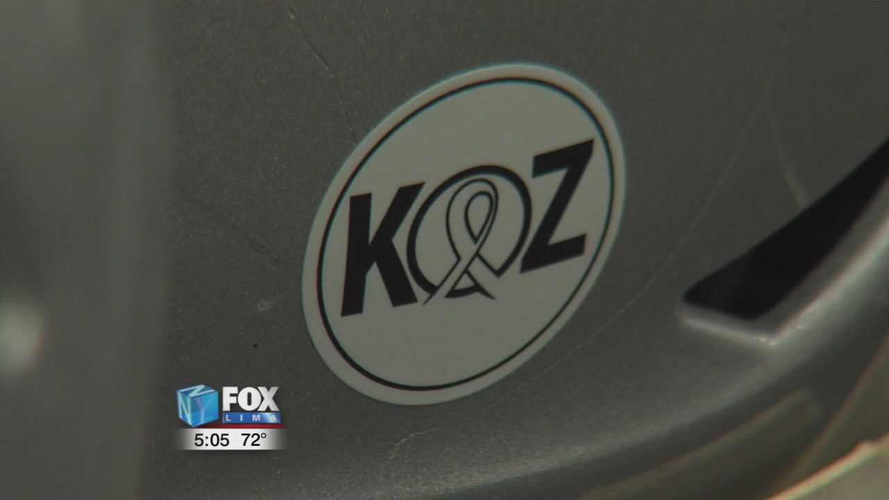 Area football teams adding Koz stickers to helmets in support of Vince Koza